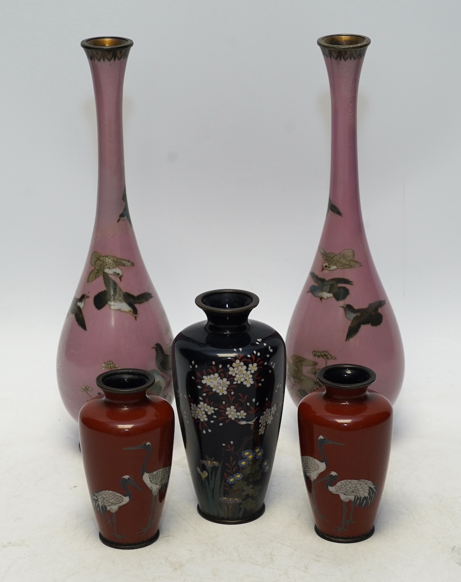 Two pairs and another Japanese cloisonné vases, Meiji period, tallest 25cm. Condition - two vases restored